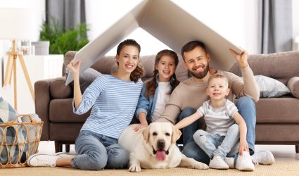 family sitting on floor together