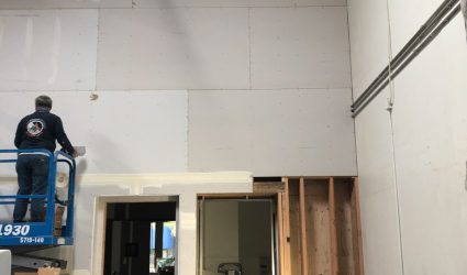 soundproofing company working on commercial building