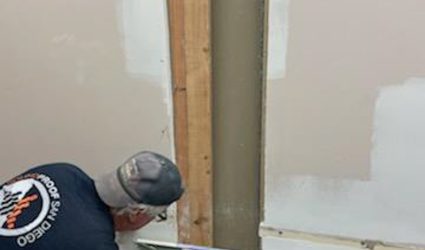 general contractor working on soundproofing commercial building